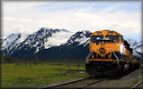 locomotive and mountains