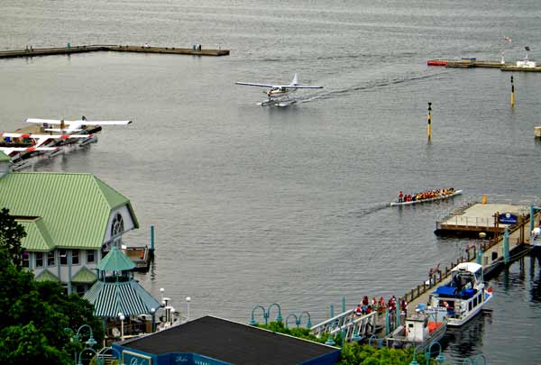 5408-PlaneComingIn-CanoeGoingOut-051506-712p