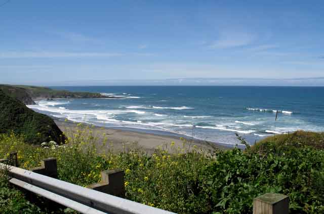 6617-PrettyBeachOnRoughRoad-052806-1116a