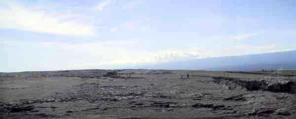 hikers on lava field