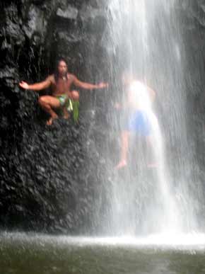 1733-Native&TouristUnderWaterfall-071007-113p